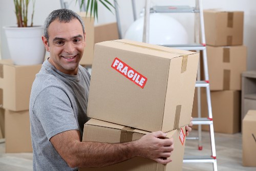 Careful packing of fragile household items during a local move in Uxbridge