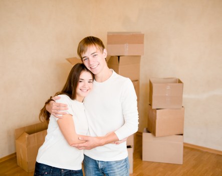 Professional movers loading household furniture for a Uxbridge home move