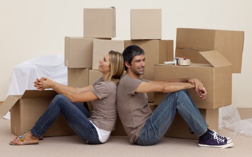 Moving van and packed boxes for a home move in Uxbridge